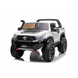 Elektrické autíčko Toyota Hilux 4X4, biele, 2 x 12V/10 Ah batéria, EVA kolesá, Kvalitné odpruženie, LED svetlá, čalúnené sedadlo, 2,4 GHz Diaľkové ovládanie, kľúč, 4X4 Pohon, Dvojmiestne, USB, SD karta, Bluetooth ORGINAL licencia